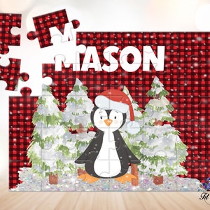 Personalized children's Christmas puzzle featuring a cute penguin wearing a Santa hat in front of snowy pine trees on a red buffalo plaid background with a custom child's name. Available in 30, 40, and 48 pieces.
