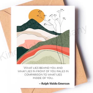 May include: Greeting card with a minimalist landscape design featuring a yellow sun, mountains, and a quote by Ralph Waldo Emerson. The card is white with a brown envelope.