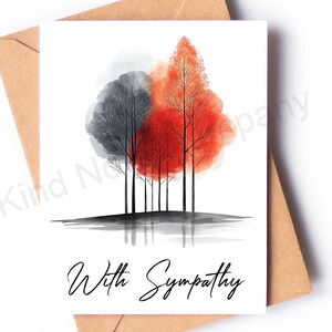 May include: A sympathy card featuring an abstract watercolor design of trees in shades of gray, red, and orange. The words "With Sympathy" are written in elegant script below the image. The card is placed on a brown envelope.
