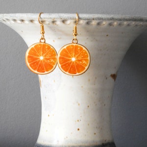 1.25" Gold tone Enamel Orange slice Charm earrings