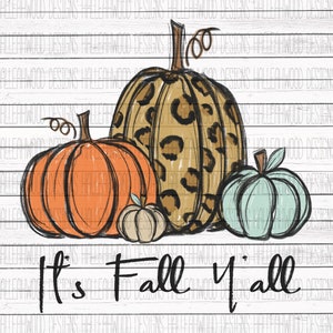 May include: A hand-drawn illustration of four pumpkins with the text "It's Fall y'all". The pumpkins are in various sizes and colors, including orange, brown, and teal. The largest pumpkin has a leopard print pattern.