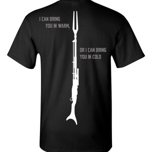 May include: Black t-shirt with a white silhouette of a weapon and the text "I can bring you in warm, or I can bring you in cold".