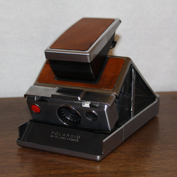 Poloroid SX-70 Land Camera with Advertising & Film