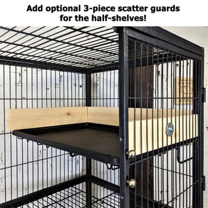 May include: A black metal cage with a rectangular shape, featuring a black tray and wooden shelves. The text at the top says, "Add optional 3-piece scatter guards for the half-shelves!"