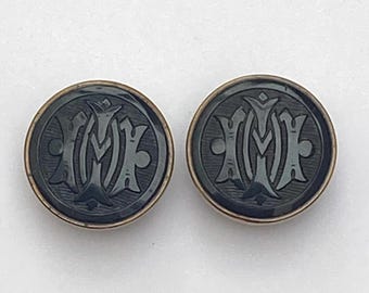 A Pair Of Antique Black Glass Bachelor Buttons
