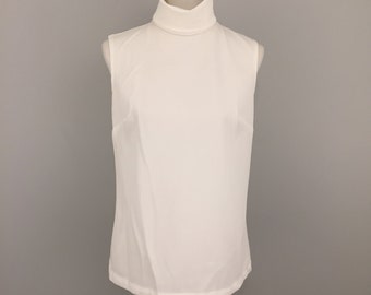 sleeveless mock turtleneck shell