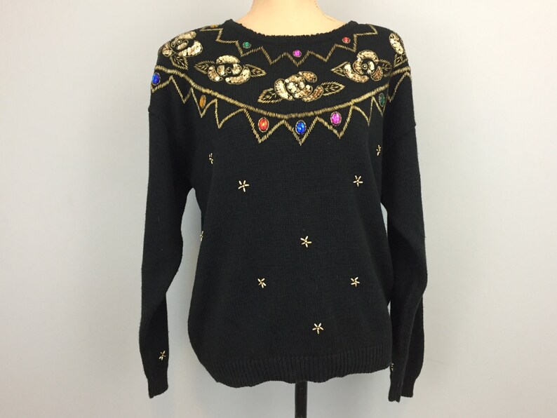 black sequin sweater