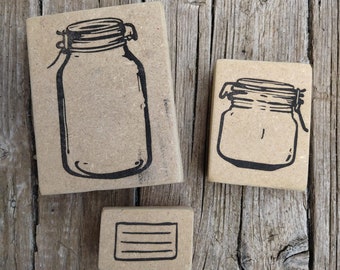 SET of handcrafted rubber stamps. Jars with capsule and label
