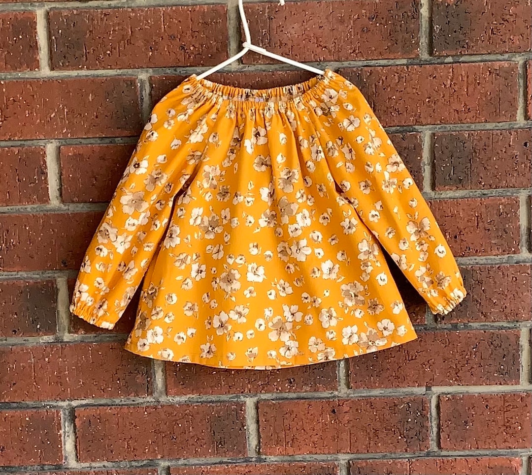 Preciosa y cómoda blusa campesina de algodón con estampado floral