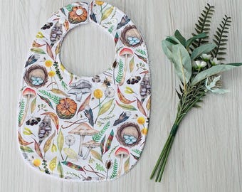 Infant patterned bib, adjustable with double snaps and towelling