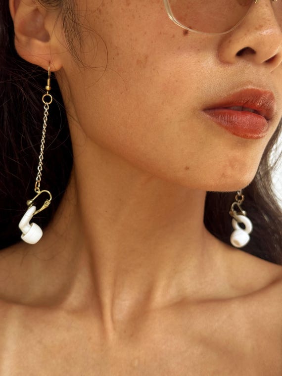 the EARPLUG earrings