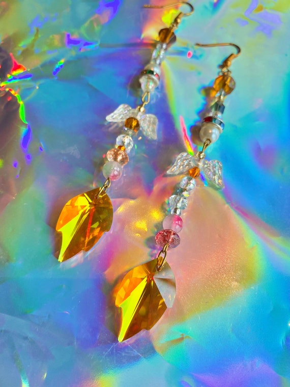 the BLAZE OF GLORY swarovski drop earrings