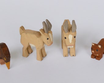 Hand Carved wooden Goats, Kiwi's and Martin