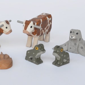 New Animals for 2019, Hand Carved Wooden Noah's Ark Animals, Topi, Florida Cracker Cows, Seals, Horse shoe crabs and Frogs.