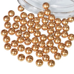 Premimum Quality Crystal Glass Pearls in Gold Color For Wedding Jewellery