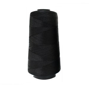 May include: A spool of black thread.