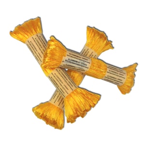 May include: Four bundles of bright yellow embroidery thread, each wrapped with a paper label. The labels contain text, including a website and contact information. The thread has a textured, slightly frayed appearance.