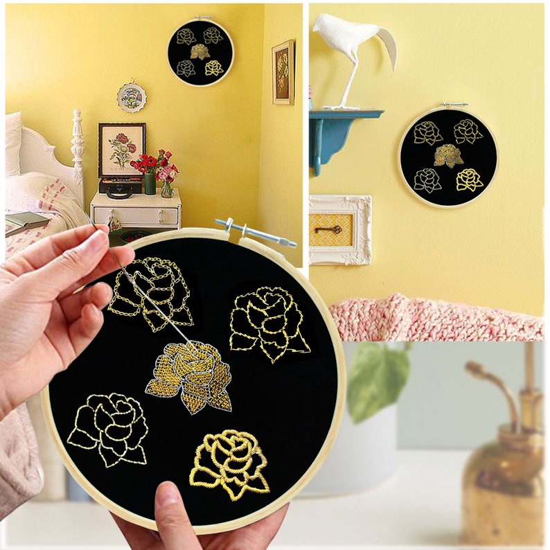 May include: A close-up of a black embroidery hoop with gold embroidery of roses. The hoop is being held by a hand and the needle is being threaded through the fabric.