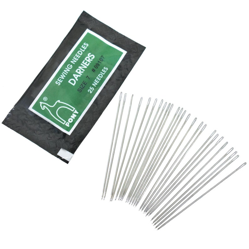 May include: A pack of 25 Pony Darners sewing needles, size 7, #08107. The needles are silver and are arranged in a fan shape. The pack is black with a green label that says "Pony Darners Sewing Needles" and has a picture of a horse.