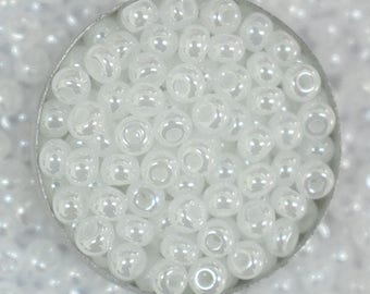 Fábrica De China Cuentas De Semillas De Vidrio Con Forma De Ojo De Gato Rondo Dos Tonos 4 Mm