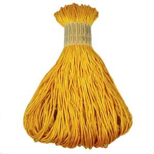 May include: A bundle of bright yellow cotton cord, tightly wrapped at the top with a paper label. The cord is fanned out below the wrapping, creating a teardrop shape. The cord appears to be new and unused.