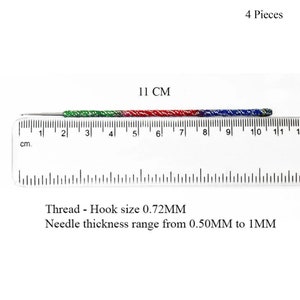 May include: A colorful crochet hook, approximately 4.3 inches long, with green, red, and blue sections. The hook is measured against a ruler, and the text indicates a hook size of 0.72mm and a needle thickness range from 0.50mm to 1mm. The image also states "4 Pieces".