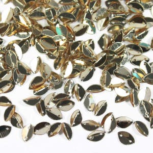50 paillettes piegate a forma di foglia (6*9 MM) - EMBSQ4954