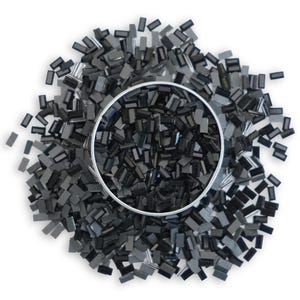 May include: A close-up of a pile of black and grey rectangular glass tiles. The tiles are arranged in a random pattern and are surrounded by a silver metal ring.