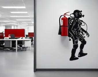 May include: A black silhouette of a scuba diver with a red fire extinguisher on their back. The diver is wearing a diving mask and has an air tank on their back. The image is on a white wall.