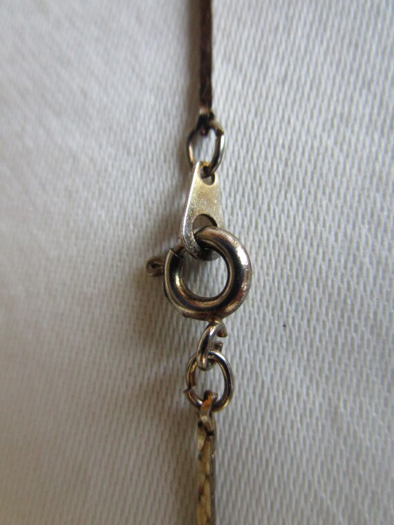 Initial D in cursive in a etched bezel on a 18' i… - image 4