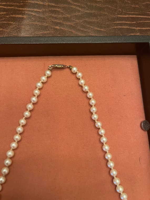 Pearl Necklace - I don't know the origin but I am 