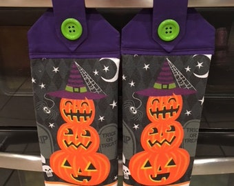 Kitchen towels set of 2. Pumpkin printed towels with Orange, grey and purple fabric top , green button closure