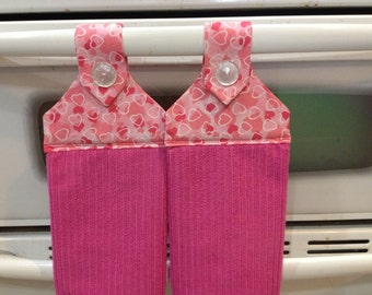 Kitchen towels set of 2, light pink microfiber towel with hearts fabric top with a white button over velcro closure