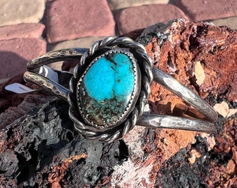 Beautiful Oval Turquoise Stone in Sterling Silver with abraided setting Bracelet