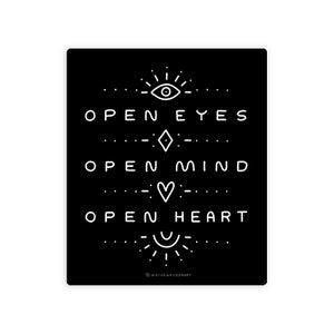 May include: Black and white graphic print with the text "Open Eyes, Open Mind, Open Heart" with a stylized eye, diamond, and heart symbol above each phrase. The text is surrounded by a dotted line pattern.