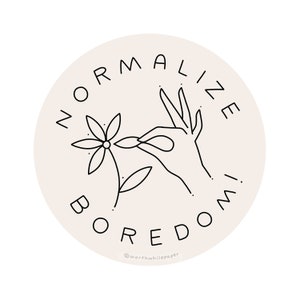 May include: Black and white line art illustration of a hand holding a flower with the text "Normalize Boredom!" in a circle.