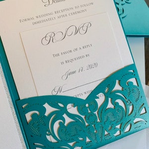 Aqua, Teal or Turquoise Laser Cut Wedding Invitation set with silver glitter in a pocket folder. Aqua Blue Laser Cut Wedding Invitation set image 3