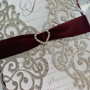 Burgundy and silver laser cut wedding invitation set. embellished wedding invitation suite, silver foil and ribbon wedding invitation sample