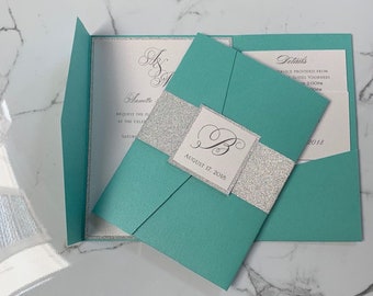 Aqua, Teal or Turquoise Wedding Invitation set with silver glitter belly band in a pocket folder. Teal Wedding Invitation, Turquoise Invites