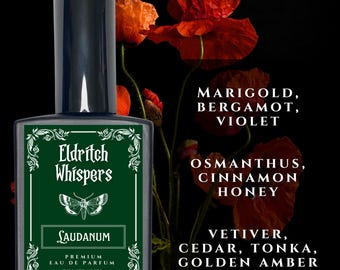 May include: A rectangular glass perfume bottle with a black cap and a dark green label featuring the text Eldritch Whispers, Laudanum, and a moth illustration. The label lists ingredients including marigold, bergamot, violet, osmanthus, cinnamon, honey, vetiver, cedar, tonka, and golden amber. The bottle contains 30ml.
