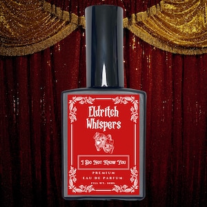 May include: A rectangular perfume bottle with a black cap and a red label. The label features the text "Eldritch Whispers" and "I Do Not Know You" in white. The bottle is filled with 30ml of perfume. The background is a red curtain.