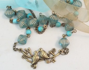 Bronze Birds on a Branch Necklace w/ Aqua and gold beads w/ aqua spacers