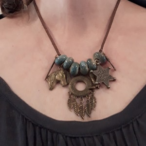 Western themed necklace with sage green ceramic beads
