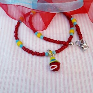 Sock monkey pendant necklace on a strand of glass seed beads image 4