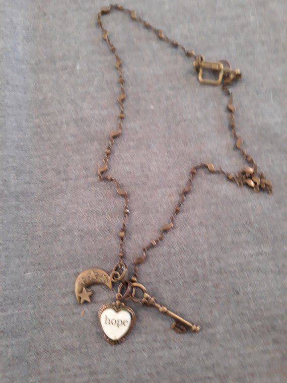 Fly me to shop the moon necklace