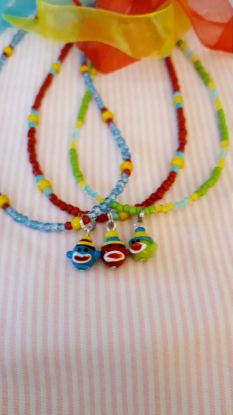 Sock monkey pendant necklace on a strand of glass seed beads image 6