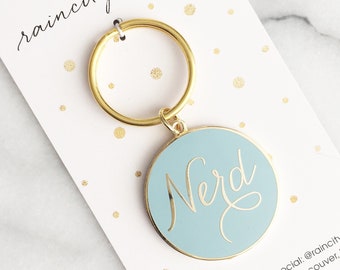 Nerd Enamel Keychain. Gold Nerd Keychain. Nerd Keyring. Nerd Enamel Pin. Nerd Accessory