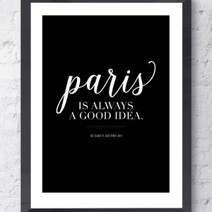 May include: Black and white printable quote with the text "Paris is always a good idea." attributed to Audrey Hepburn.