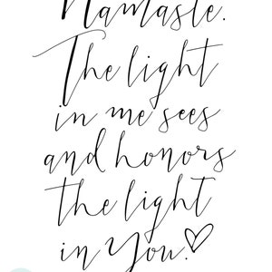 May include: A white print with black cursive text that reads "Namaste. The light in me sees and honors the light in You!" with a heart symbol. The words "RAINCITY PRINTS" are at the bottom left.