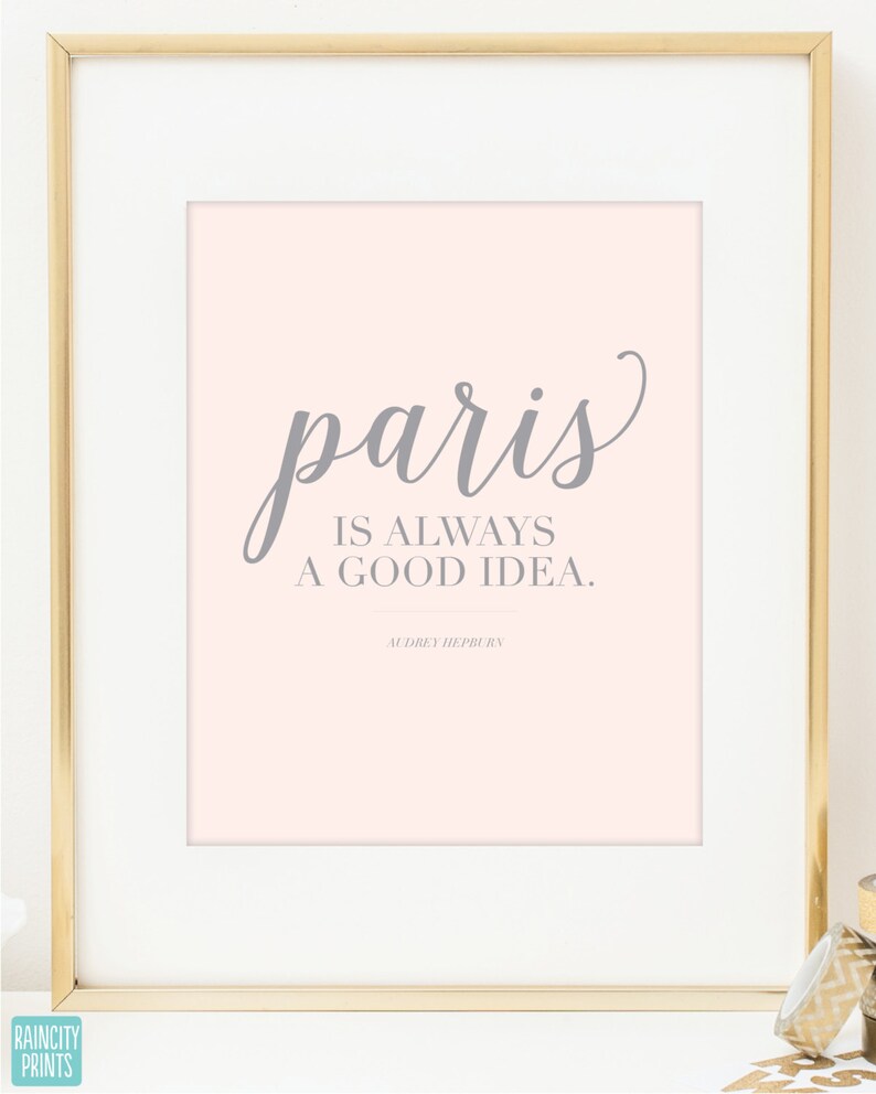 May include: A pink printable quote with the text "paris is always a good idea."  The quote is attributed to Audrey Hepburn.